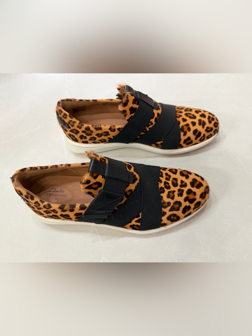 Clarks Un Rio Strap Leopard-Print Pony Hair Slip-On Sneakers with Black Straps